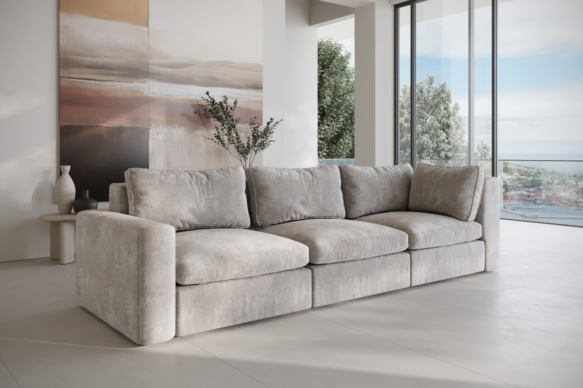 elegancka sofa do salonu z nietypowym układem boczków
