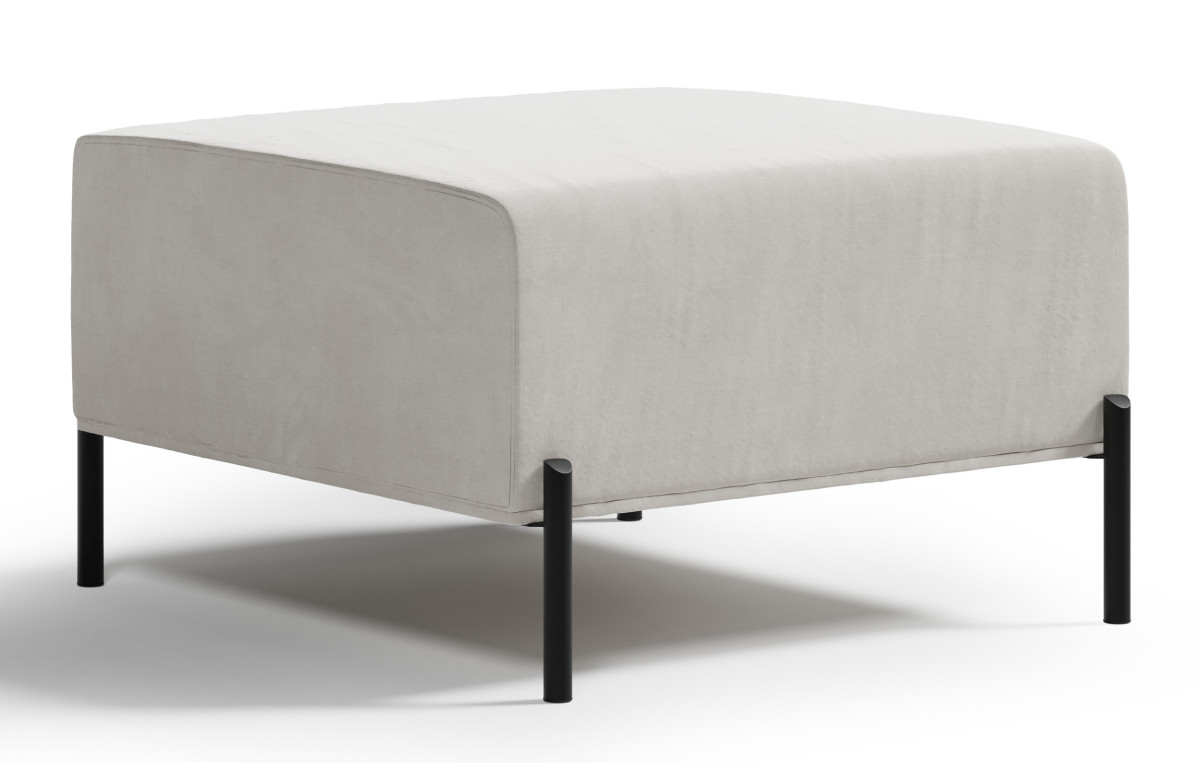 miękka pufa Cuscino obok sofy