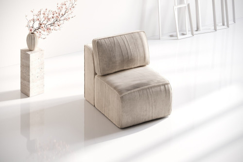 designerski fotel tapicerowany
